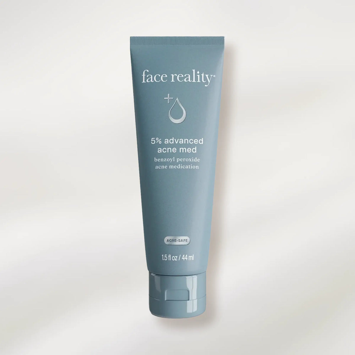 Tube of 'face reality' 5% advanced acne med on a white background