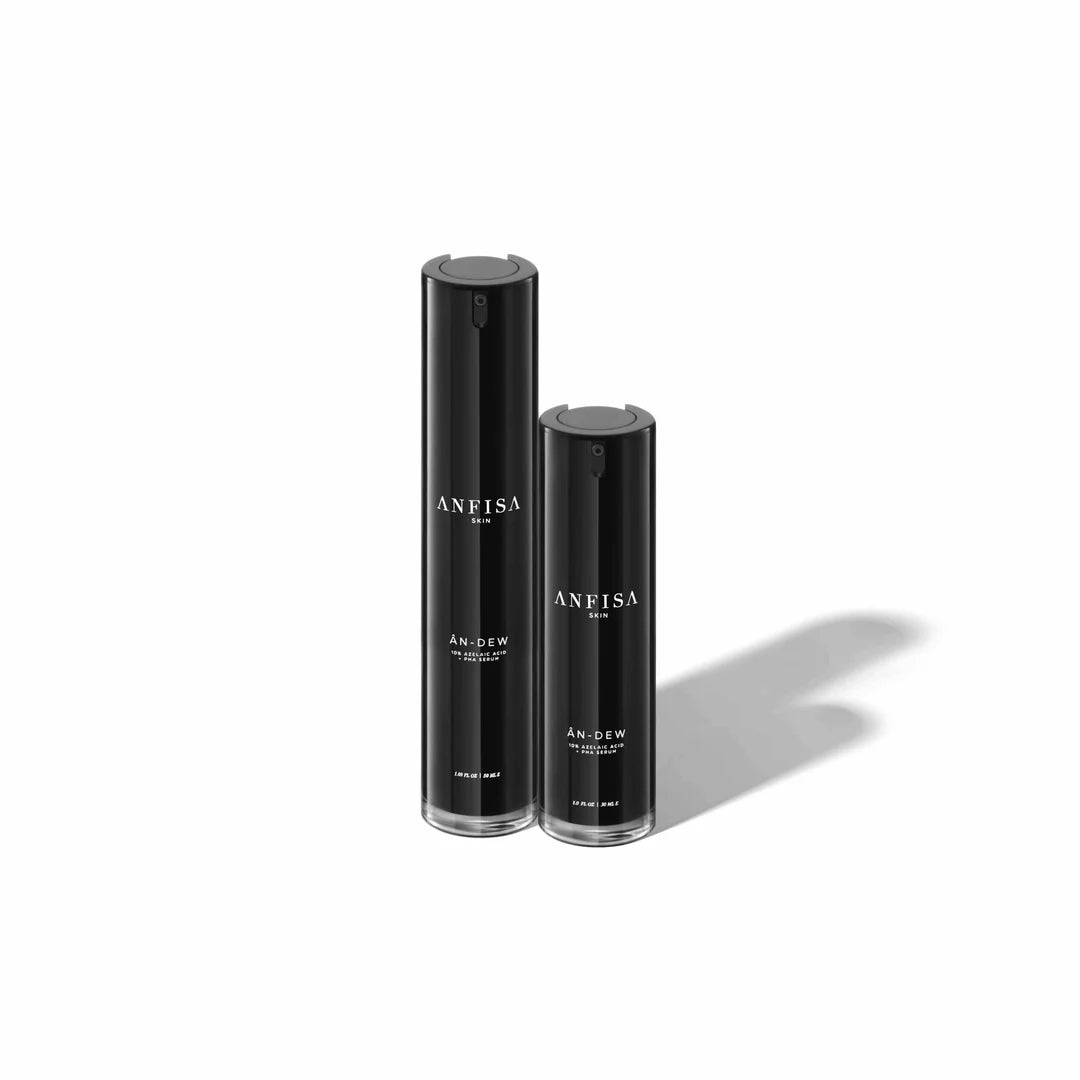 Two black ANPISA skincare bottles on a white background
