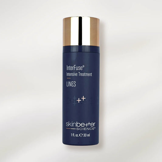 Blue skincare bottle with silver cap on a white background