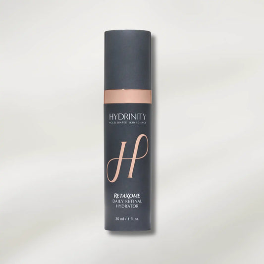 Skincare product packaging with 'Hydrinity' branding on a light gray background