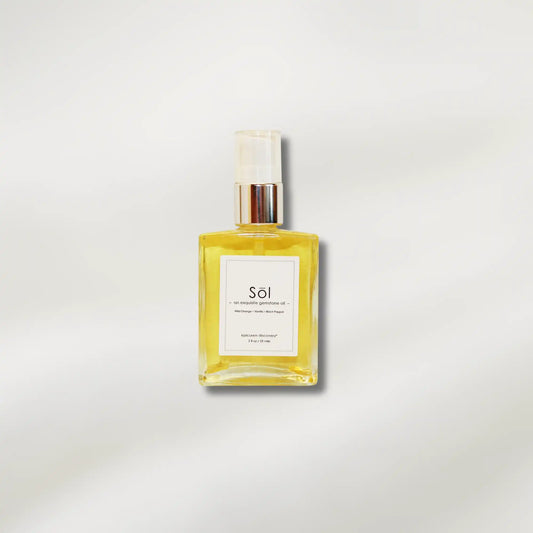 Yellow bottle of 'Sol' on a light gray background