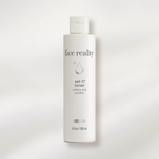 Face reality sai-C toner bottle on a white background