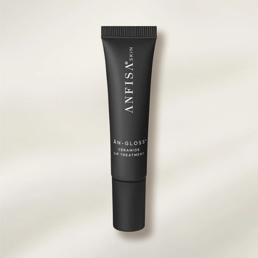 Black lip treatment tube with 'ANFISA SKIN' branding on a light beige background