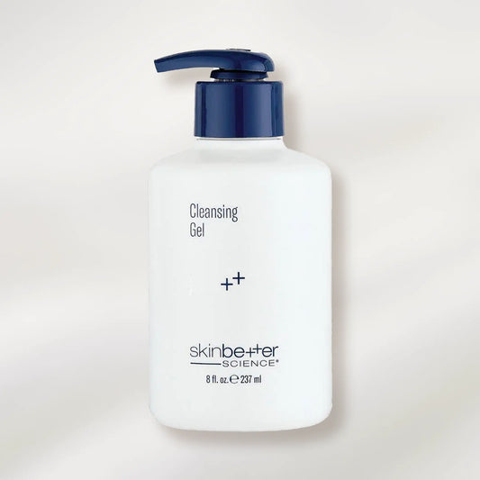 Bottle of cleansing gel with a blue pump on a white background