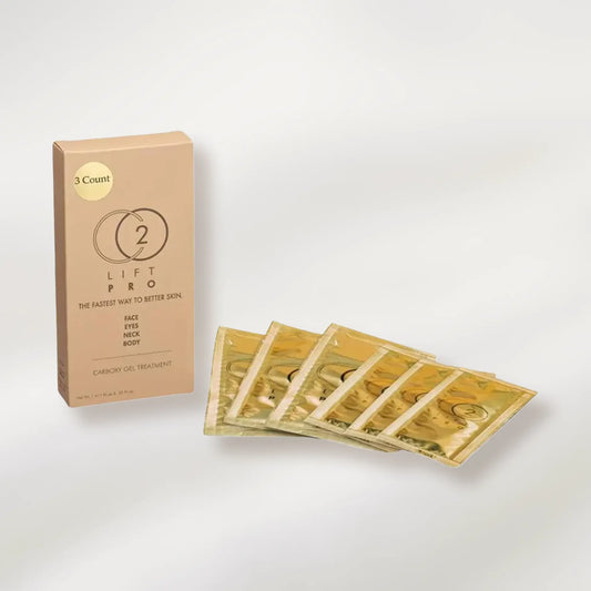 Gold wax strips and packaging on a white background