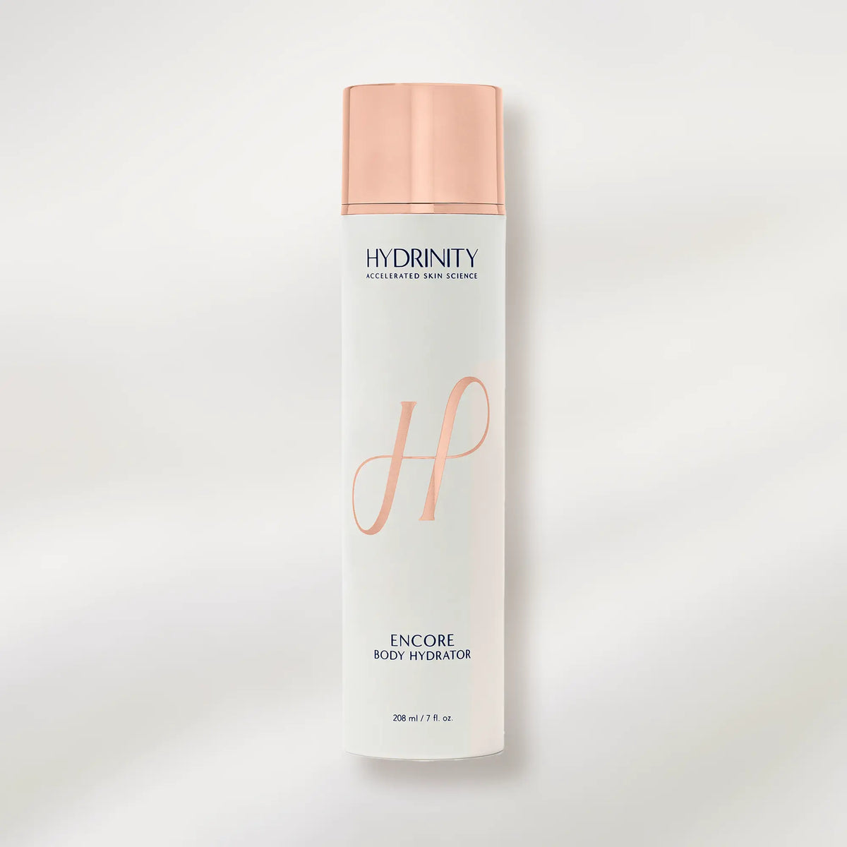 Hydrinity Encore Body Hydrator bottle with rose gold cap and design on a light gray background