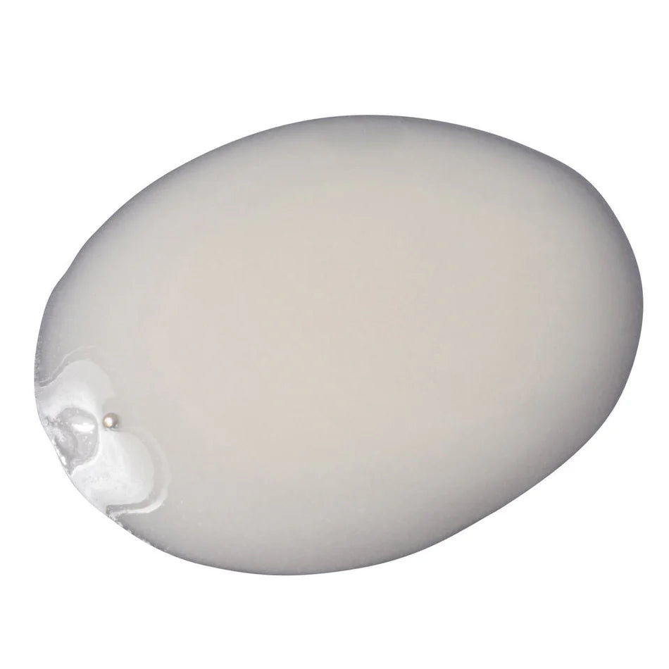 Round white object with a small opening on a white background