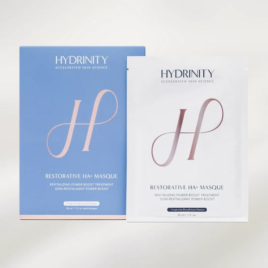 Two Hydrinity Restorative HA+ Masque packages on a light gray background