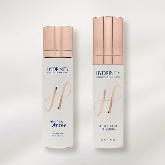 Two skincare bottles from Hydrinity on a white background