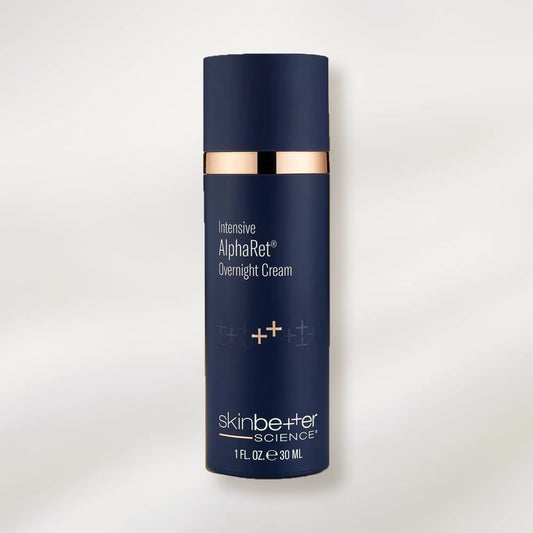 Blue skincare cream bottle with rose gold accents on a white background