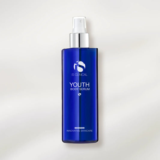 Blue bottle of iS Clinical Youth Body Serum on a light gray background