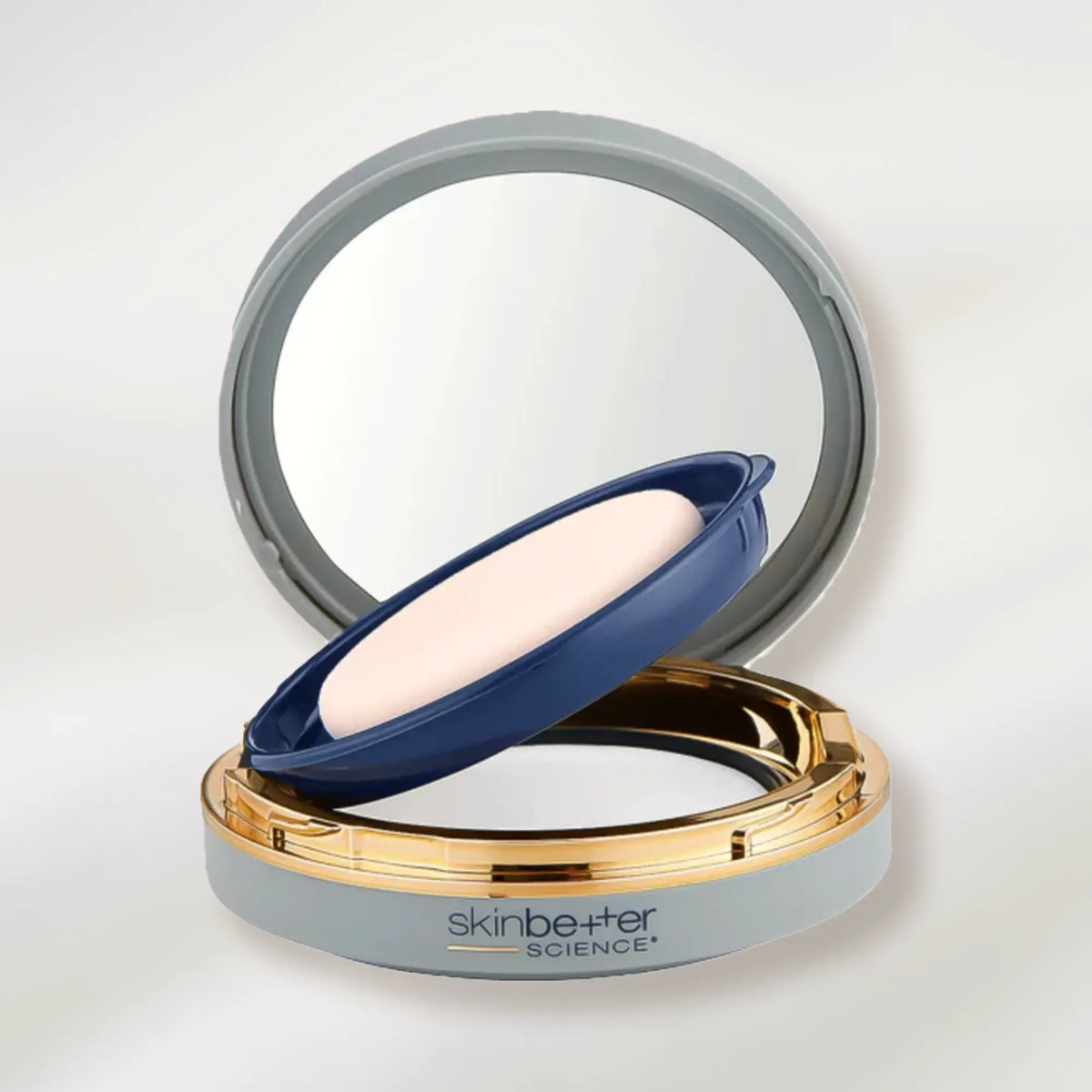 Compact powder with mirror and 'skinbetter science' branding on a light gray background