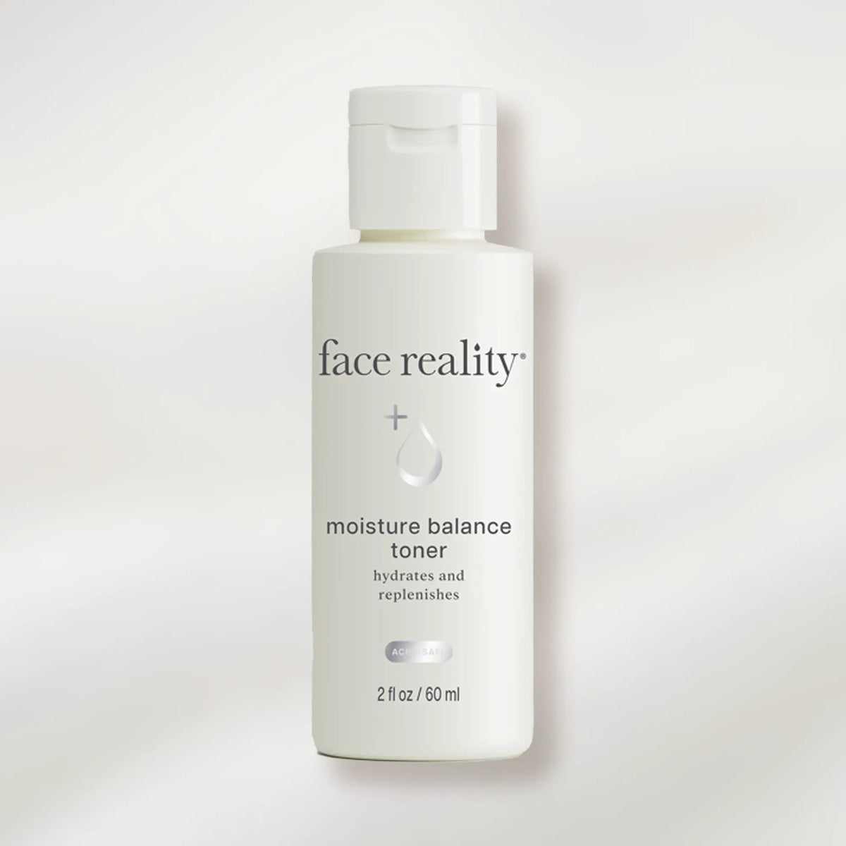 Bottle of 'face reality' moisture balance toner on a white background